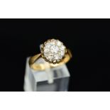 A DIAMOND CLUSTER RING, designed as a cluster of old and modern round brilliant-cut diamonds,