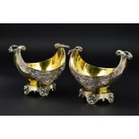 A PAIR OF LATE VICTORIAN ELKINGTON & CO PARCEL GILT ELECTROPLATE TWIN HANDLED SWEETMEAT BASKETS,