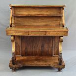 A REGENCY ROSEWOOD, ROSEWOOD STAINED AND BRASS INLAID BUFFET, pierced brass gallery to top tier