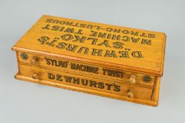 A DEWHURSTS 'SYLKO' HABERDASHERS OAK TWO DRAWER COTTON REEL STORAGE BOX, with gilt and black text to