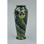 A DOULTON LAMBETH ART NOUVEAU VASE BY ETHEL BEARD, having a raised flower decoration over a