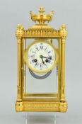 A LATE 19TH CENTURY FRENCH ORMOLU AND FOUR GLASS MANTEL CLOCK, enamel dial with Roman and Arabic