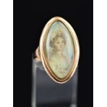 A LATE 18TH CENTURY PORTRAIT MEMORIAL RING, a navette shaped portrait depicting a lady in