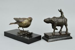 A LATE 20TH CENTURY BRONZED FIGURE OF A THRUSH STANDING ON LEAVES AND TWIGS, soldered TF 80 to