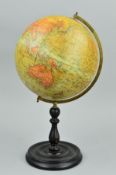 A 'GEOGRAPHICA' 10'' TERRESTRIAL GLOBE, on a turned wooden stand, height approximately 46cm (