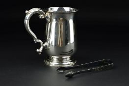 A GEORGE V SILVER BALUSTER TANKARD, cast 'S' scroll handle, stepped circular foot, makers Goldsmiths