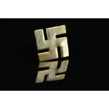 AN EARLY 20TH CENTURY CHARLES HORNER SILVER GILT SWASTIKA FYLFOT ICON BROOCH, measuring