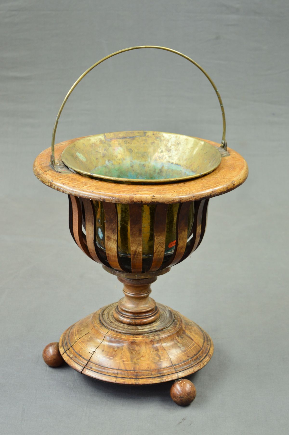 A 19TH CENTURY WALNUT STAINED AND WALNUT JARDINIERE, with boxwood stringing, circular top fitted