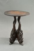 A LATE 19TH CENTURY ANGLO-INDIAN CARVED HARD WOOD OCCASIONAL TABLE, the circular top with carved