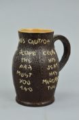 A DOULTON LAMBETH 'THE LANDLORDS CAUTIONS' BLACKJACK JUG, with a warning script over the Slaters