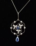 AN EARLY 20TH CENTURY SAPPHIRE AND DIAMOND FOLIATE DESIGN PENDANT, milligrain set, fine openwork