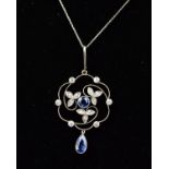 AN EARLY 20TH CENTURY SAPPHIRE AND DIAMOND FOLIATE DESIGN PENDANT, milligrain set, fine openwork