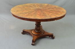 A VICTORIAN FLAME MAHOGANY TILT TOP BREAKFAST TABLE, with twelve sectional panels of veneer to the