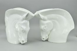 A RAOHL SCHORR FOR ROYAL WORCESTER PAIR OF WHITE GLAZED HORSE'S HEAD VASES, green printed factory
