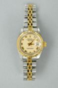 A LADIES ROLEX OYSTER PERPETUAL DATE JUST AUTO, two tone stainless steel, 1993, with 'Garantie',