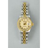 A LADIES ROLEX OYSTER PERPETUAL DATE JUST AUTO, two tone stainless steel, 1993, with 'Garantie',