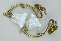 A PAIR OF ART NOUVEAU BRASS WALL LIGHTS, stamped oval wall brackets with cylindrical arm mounted