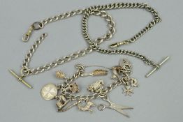 A CHARM BRACELET AND TWO ALBERT CHAINS, the curb link charm bracelet suspending twelve charms,