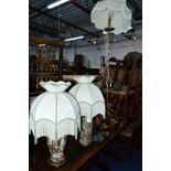 A QUANTITY OF LAMPS, including an Oriental table lamp, three other lamps and a metal standard