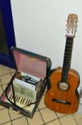 A SPANISH FRANCISCO SIX STRING GUITAR AND SOFT CASE, together with a piano accordian by L