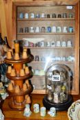 A COLLECTION OF TREEN, CERAMIC AND METAL THIMBLES, all in three display cases, together with a Royal