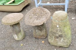 THREE VARIOUS STADDLE STONE BASES, two with composite tops (All proceeds to Lichfield Local