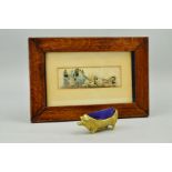 A BRASS 'PIG' PIN CUSHION, together with a framed Stevengraph of coach and horses (2)