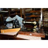 A DISTRESSED OAK CASED SINGER SEWING MACHINE, and another sewing machine (2)