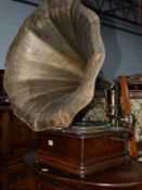 AN OAK CASED WIND UP GRAMOPHONE, with brass horn, stamped The Royal Hudson to front, horn diameter
