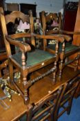A SET OF SIX REPRODUX OAK DINING CHAIRS, including two carvers