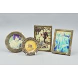 FOUR VARIOUS SILVER PHOTOGRAPH FRAMES, two rectangular and two circular, various dates and makers,