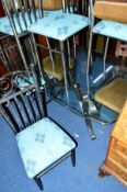 A MODERN WROUGHT IRON FRAMED DINING TABLE, with glass top, width 152cm x depth 89cm x height 73cm,