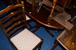 A DARK OAK DROP LEAF TABLE, and four ladderback chairs (5)
