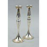 A PAIR OF MODERN CONTINENTAL SILVER CANDLESTICKS, stamped 925 to bottom edge, loaded bases, height