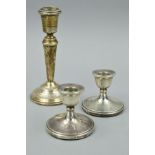 A PAIR OF ELIZABETH II DWARF SILVER CANDLESTICKS, Birmingham 1974, height 6.5cm, together with a