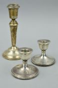 A PAIR OF ELIZABETH II DWARF SILVER CANDLESTICKS, Birmingham 1974, height 6.5cm, together with a