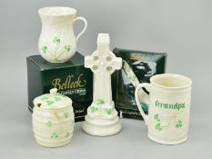 FIVE ITEMS OF BELLEEK PORCELAIN, 'Shamrock' pattern to include two mugs, a cross, preserve pot and a