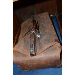 A DISTRESSED BROWN LEATHER GLADSTONE BAG