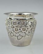 AN EDWARDIAN SILVER PLANT HOLDER, beaded rim, floral embossed body, makers Walker & Hall, Birmingham