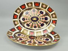 TWO GRADUATING OVAL ROYAL CROWN DERBY IMARI MEAT PLATTERS, '1128' pattern, lengths 41cm and 34cm (