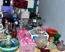 A GROUP OF COLOURED AND CLEAR GLASS PAPERWEIGHTS, VASES, DECANTERS, etc, to include Strathearn,