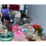 A GROUP OF COLOURED AND CLEAR GLASS PAPERWEIGHTS, VASES, DECANTERS, etc, to include Strathearn,