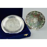 AN EGYPTIAN SILVER PLATE, engraved decoration within a wavy circular rim, marked verso, including