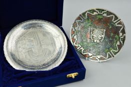 AN EGYPTIAN SILVER PLATE, engraved decoration within a wavy circular rim, marked verso, including