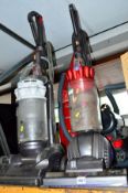 A DYSON DC55 VACUUM CLEANER, a Dyson CD14 vacuum and two other vacuum cleaners (with a box of