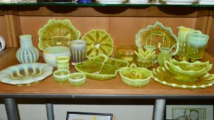 A COLLECTION OF YELLOW VASELINE/URANIUM GLASS, to include bowls dishes, bud vases, goblet, water
