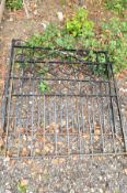 A PAIR OF WROUGHT IRON DRIVEWAY GATES, approximate height 116cm x total width 242cm