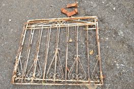 A PAIR OF CAST IRON DRIVE WAY GATES