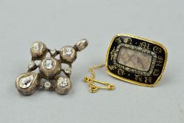 AN EARLY 19TH CENTURY GOLD MOURNING BROOCH AND A PASTE PENDANT, the brooch of rectangular outline