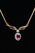 A RUBY AND DIAMOND NECKLACE, the central oval ruby within a brilliant cut diamond surround to the